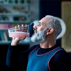 man drinking shake